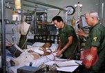 Image of injured man Vietnam, 1968, second 22 stock footage video 65675070270