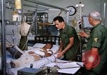 Image of injured man Vietnam, 1968, second 24 stock footage video 65675070270