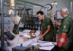 Image of injured man Vietnam, 1968, second 25 stock footage video 65675070270