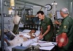 Image of injured man Vietnam, 1968, second 26 stock footage video 65675070270