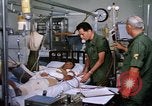 Image of injured man Vietnam, 1968, second 29 stock footage video 65675070270