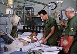 Image of injured man Vietnam, 1968, second 34 stock footage video 65675070270