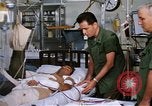 Image of injured man Vietnam, 1968, second 40 stock footage video 65675070270