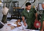Image of injured man Vietnam, 1968, second 44 stock footage video 65675070270