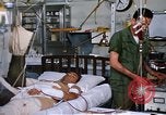 Image of injured man Vietnam, 1968, second 47 stock footage video 65675070270