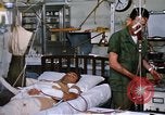 Image of injured man Vietnam, 1968, second 48 stock footage video 65675070270