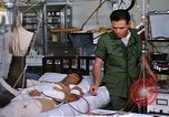 Image of injured man Vietnam, 1968, second 50 stock footage video 65675070270