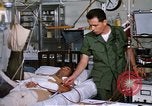 Image of injured man Vietnam, 1968, second 53 stock footage video 65675070270