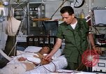Image of injured man Vietnam, 1968, second 54 stock footage video 65675070270