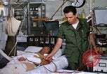 Image of injured man Vietnam, 1968, second 56 stock footage video 65675070270