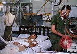 Image of injured man Vietnam, 1968, second 61 stock footage video 65675070270