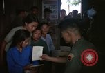 Standbild vietnamesischen Dorfbewohner Vietnam, 1965, aus Sekunde 16 historischem Filmmaterial Videoclip 65675070298