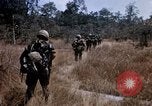 Image of American soldiers South Vietnam, 1967, second 32 stock footage video 65675070318