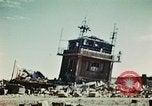 Image of wreckage on airfield France, 1944, second 15 stock footage video 65675070347