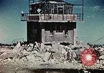Image of wreckage on airfield France, 1944, second 23 stock footage video 65675070347