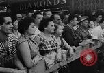 Image of invitational preview of film "Man of a Thousand Faces" New York City USA, 1957, second 10 stock footage video 65675070397