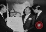 Image of invitational preview of film "Man of a Thousand Faces" New York City USA, 1957, second 27 stock footage video 65675070397