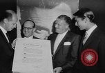 Image of invitational preview of film "Man of a Thousand Faces" New York City USA, 1957, second 29 stock footage video 65675070397