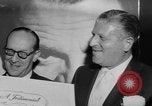 Image of invitational preview of film "Man of a Thousand Faces" New York City USA, 1957, second 34 stock footage video 65675070397