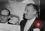 Image of invitational preview of film "Man of a Thousand Faces" New York City USA, 1957, second 35 stock footage video 65675070397