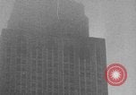 Image of aircraft crash into Empire State Building New York City USA, 1945, second 20 stock footage video 65675070402