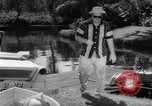Standbild Mann angeln gehen und Waschbecken kleinen Boot Florida United States USA, 1961, aus Sekunde 31 historischem Filmmaterial Videoclip 65675070432