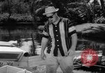 Standbild Mann angeln gehen und Waschbecken kleinen Boot Florida United States USA, 1961, aus Sekunde 33 historischem Filmmaterial Videoclip 65675070432
