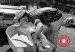 Standbild Mann angeln gehen und Waschbecken kleinen Boot Florida United States USA, 1961, aus Sekunde 37 historischem Filmmaterial Videoclip 65675070432