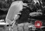 Standbild Mann angeln gehen und Waschbecken kleinen Boot Florida United States USA, 1961, aus Sekunde 40 historischem Filmmaterial Videoclip 65675070432