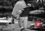 Standbild Mann angeln gehen und Waschbecken kleinen Boot Florida United States USA, 1961, aus Sekunde 42 historischem Filmmaterial Videoclip 65675070432