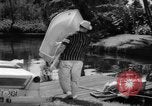 Standbild Mann angeln gehen und Waschbecken kleinen Boot Florida United States USA, 1961, aus Sekunde 43 historischem Filmmaterial Videoclip 65675070432