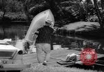 Standbild Mann angeln gehen und Waschbecken kleinen Boot Florida United States USA, 1961, aus Sekunde 44 historischem Filmmaterial Videoclip 65675070432