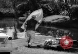 Standbild Mann angeln gehen und Waschbecken kleinen Boot Florida United States USA, 1961, aus Sekunde 45 historischem Filmmaterial Videoclip 65675070432