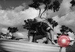 Standbild Mann angeln gehen und Waschbecken kleinen Boot Florida United States USA, 1961, aus Sekunde 50 historischem Filmmaterial Videoclip 65675070432
