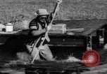 Standbild Mann angeln gehen und Waschbecken kleinen Boot Florida United States USA, 1961, aus Sekunde 59 historischem Filmmaterial Videoclip 65675070432