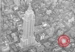 Image of Empire State Building on opening day New York City USA, 1931, second 19 stock footage video 65675070440