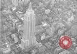Image of Empire State Building on opening day New York City USA, 1931, second 20 stock footage video 65675070440