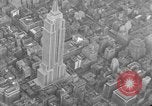 Image of Empire State Building on opening day New York City USA, 1931, second 22 stock footage video 65675070440