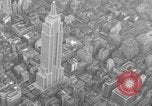 Image of Empire State Building on opening day New York City USA, 1931, second 24 stock footage video 65675070440