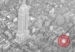 Image of Empire State Building on opening day New York City USA, 1931, second 26 stock footage video 65675070440