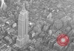 Image of Empire State Building on opening day New York City USA, 1931, second 27 stock footage video 65675070440
