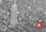 Image of Empire State Building on opening day New York City USA, 1931, second 28 stock footage video 65675070440