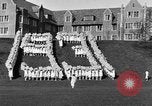 Image of annual hoop roll Wellesley Massachusetts USA, 1931, second 12 stock footage video 65675070441