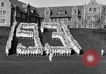 Image of annual hoop roll Wellesley Massachusetts USA, 1931, second 14 stock footage video 65675070441