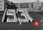Image of annual hoop roll Wellesley Massachusetts USA, 1931, second 15 stock footage video 65675070441