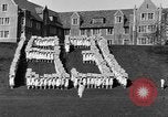 Image of annual hoop roll Wellesley Massachusetts USA, 1931, second 16 stock footage video 65675070441