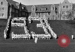 Image of annual hoop roll Wellesley Massachusetts USA, 1931, second 18 stock footage video 65675070441