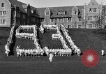Image of annual hoop roll Wellesley Massachusetts USA, 1931, second 19 stock footage video 65675070441