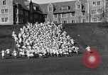 Image of annual hoop roll Wellesley Massachusetts USA, 1931, second 20 stock footage video 65675070441