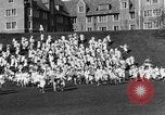 Image of annual hoop roll Wellesley Massachusetts USA, 1931, second 23 stock footage video 65675070441